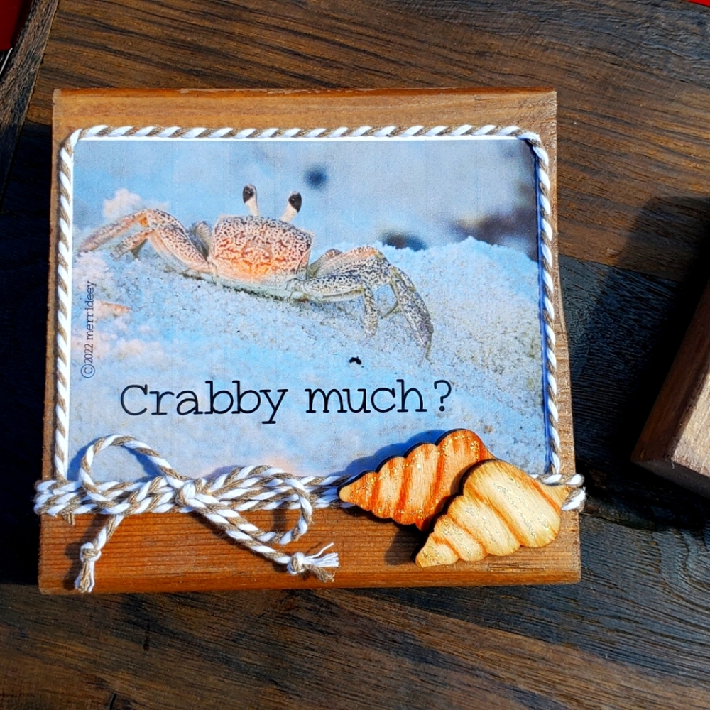 Shelf sitter with crab picture